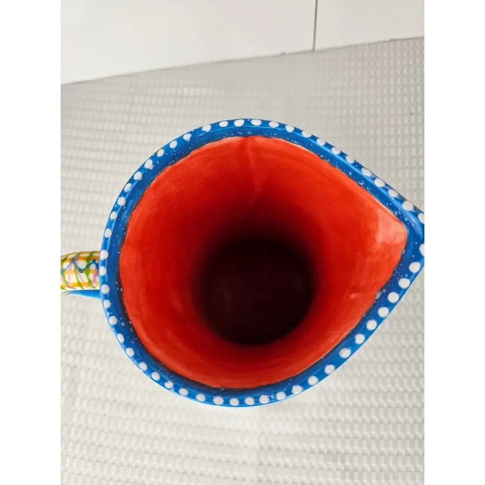 Fusion Pottery Yellow Flower and Blue Pitcher‎ w/handle and Red Finish Inside